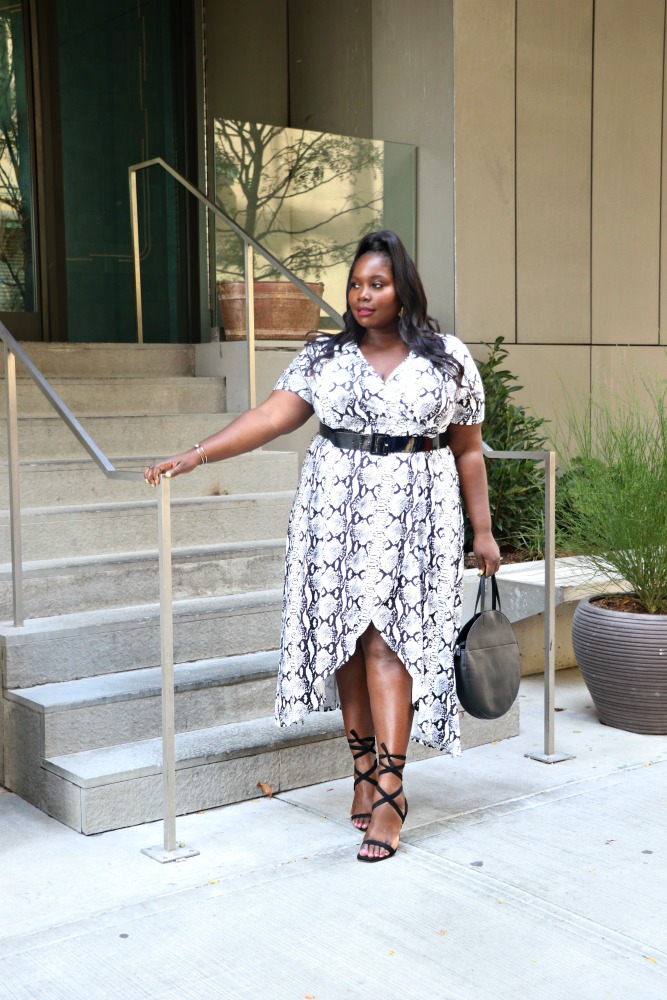 plus size woman in snake skin print dress 