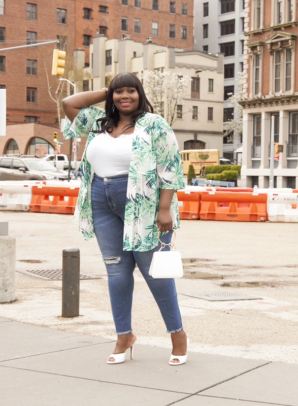 cute plus size spring tops from lane bryant. Black Plus size woman in a tropical print tie waist top from Lane Bryant